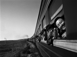 foto viaggiatori sul treno Wang Fuchun