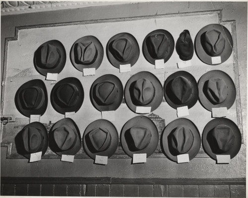 Weegee: [Hats in a pool room, Mulberry Street, New York], ca. 1943. Gelatin silver print © Weegee/International Center of Photography International Center of Photography