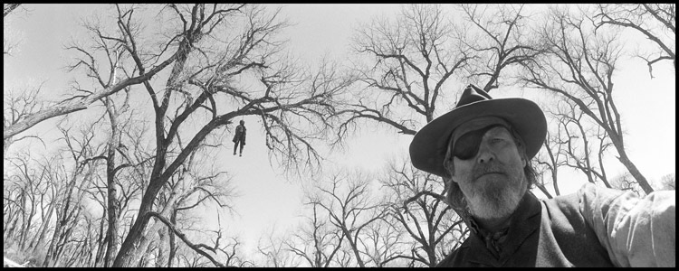 © 2015 Jeff Bridges, All Rights Reserved, Jeff  Bridges, with hanging man in tree, True Grit, 2010 