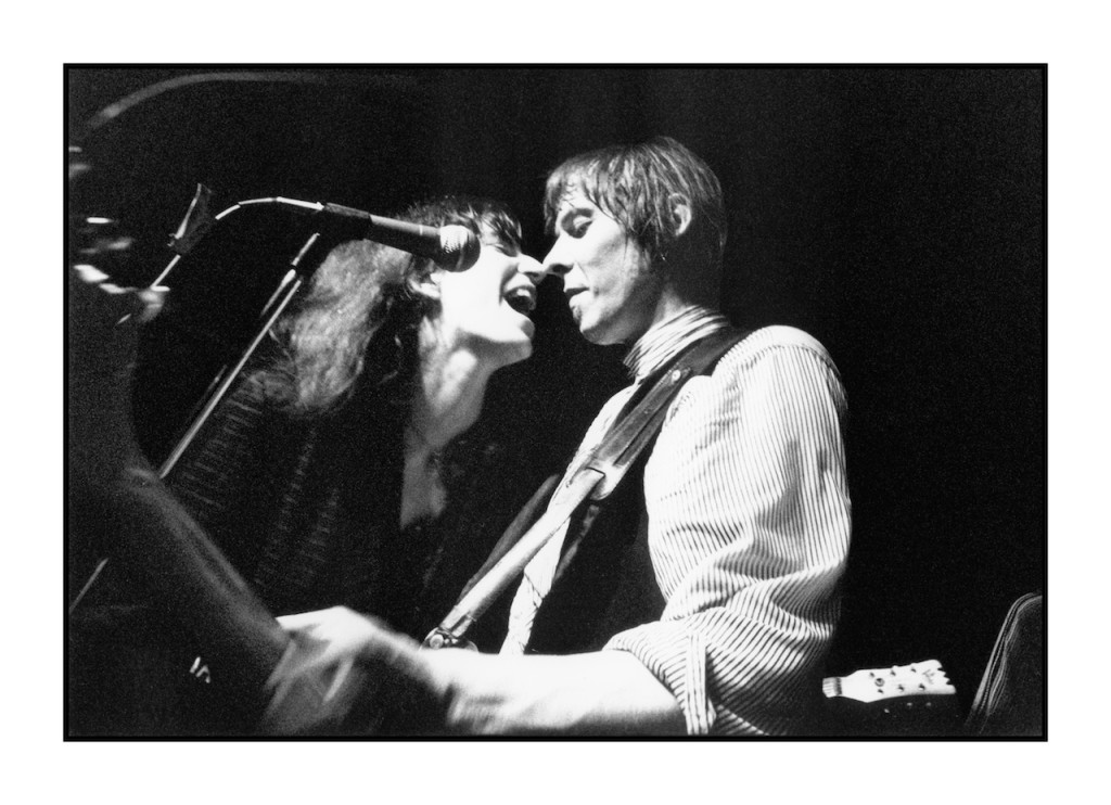 Patti Smith guesting with Fred Sonic Smith's Sonic's Rendezvous Band at the New Miami in Detroit, Michigan, 1980.  Pictured:  Patti Smith, guitarist Fred Sonic Smith, and bassist Gary Rasmussen.  Patti Smith later married Fred Sonic Smith.