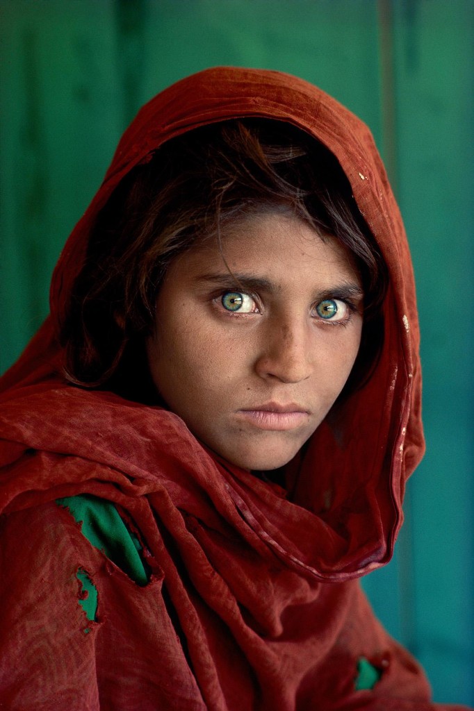 Steve McCurry: Sharbat Gula, Afghan Girl, at Nasir Bagh refugee camp near Peshawar, Pakistan, 1984. Peshawar, Pakistan, 1984 ©Steve McCurry.