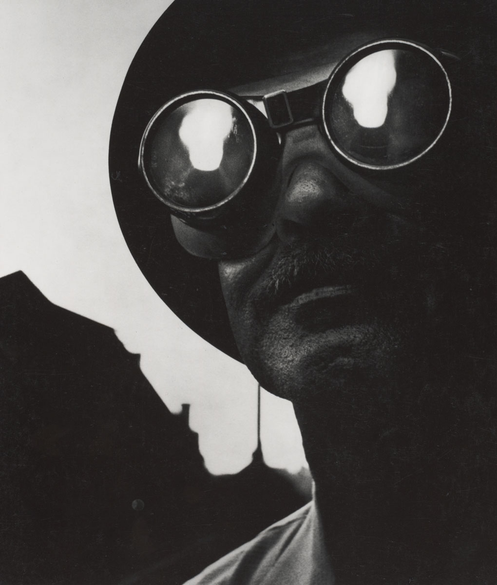 W. Eugene Smith, Steelworker with Goggles, Pittsburgh, 1955, ©The Heirs of W. Eugene Smith
