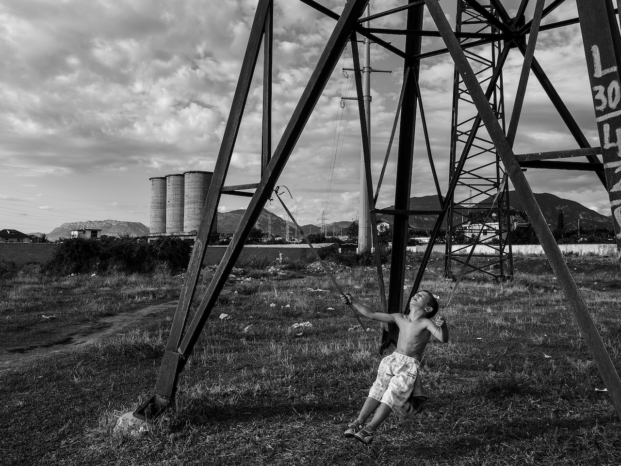 In the suburb of Tirana. Boy playing in their neighborhood. Tirana, 2015