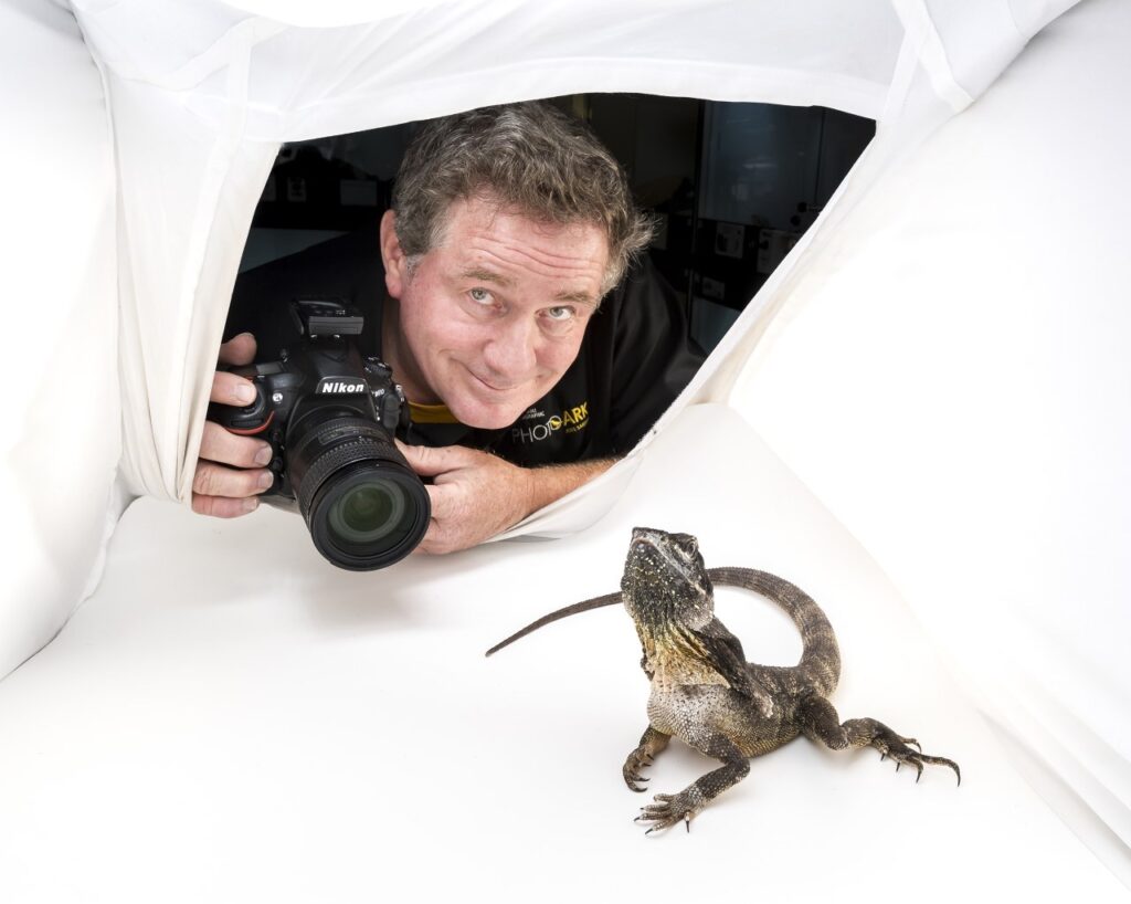 Joel Sartore and frill necked lizard © Douglas Gimesy