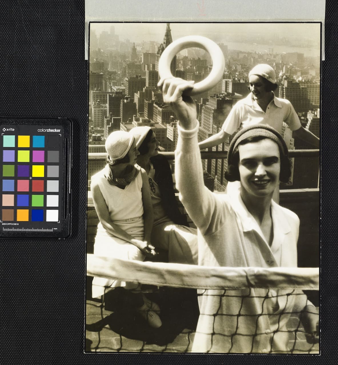 MARGARET BOURKE-WHITE, Rooftop deck-tennis players, against Manhattan skyline, 1931, Vogue © Condé Nast